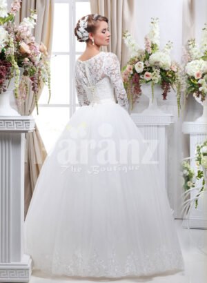 Women’s full sleeve beautiful lacy bodice flared tulle skirt wedding gown in white back side view