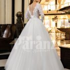 Women’s full sleeve glam lacy bodice and tulle skirt floor length wedding gown back side view
