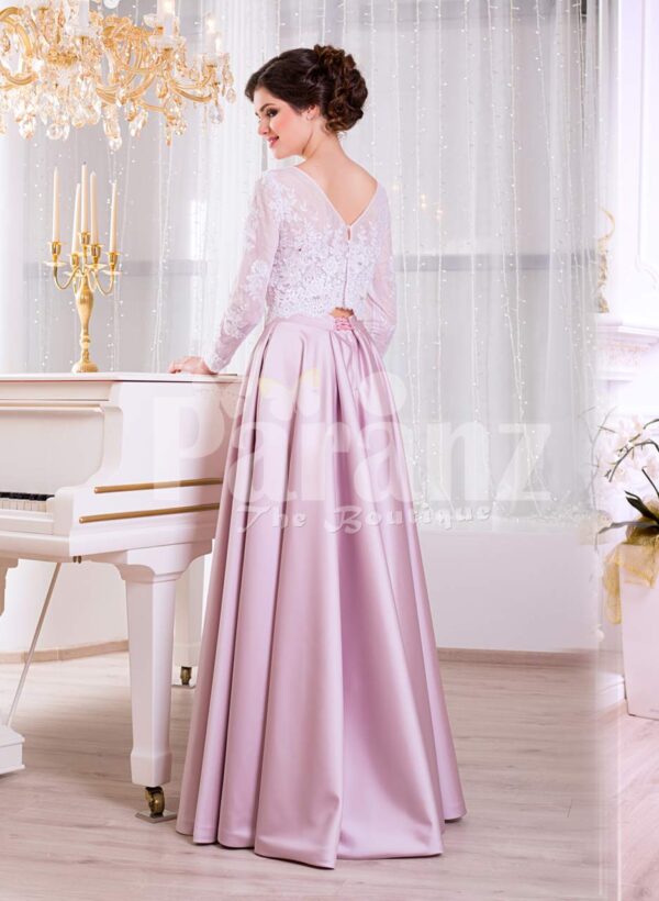 Women’s full sleeve lace appliquéd bodice evening gown with sleek satin long skirt side veiw