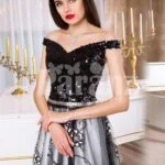 Women’s glam black bodice floor length evening gown with silver tulle skirt