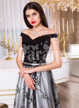 Women’s glam black bodice floor length evening gown with silver tulle skirt