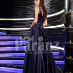 Women’s glam metal navy evening gown with flared satin skirt and royal appliquéd bodice back side view