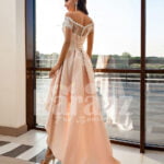 Women’s high-low rich satin wedding dress with stunning appliquéd bodice back side view