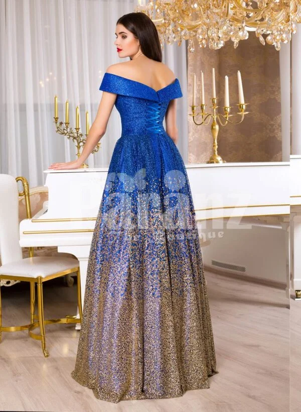 Women’s high volume satin evening gown with tulle skirt underneath and off-shoulder bodice back side view