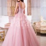 Women’s high volume tulle skirt evening gown with lacy pink bodice back side view