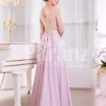 Women’s lacy beige bodice evening gown with long metal mauve skirt side view