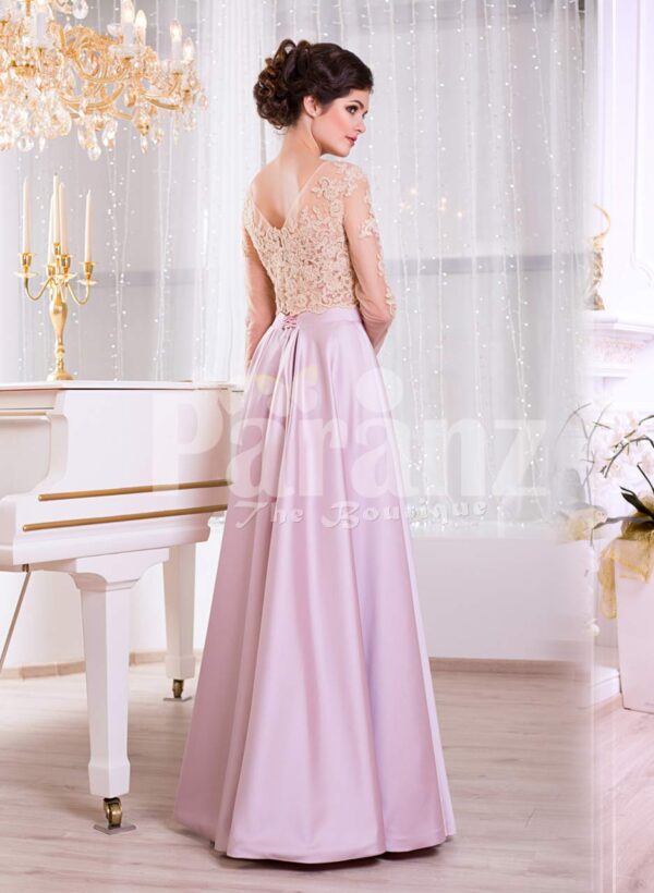 Women’s lacy beige bodice evening gown with long metal mauve skirt side view
