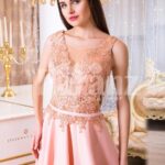 Women’s long evening glam gown with royal rhinestone bodice in peach hue