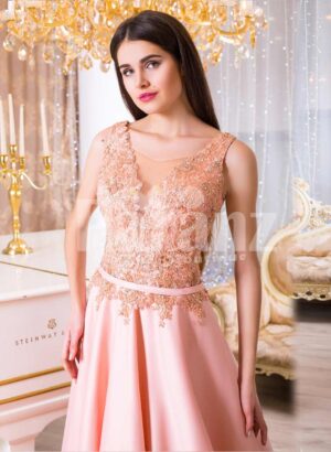 Women’s long evening glam gown with royal rhinestone bodice in peach hue