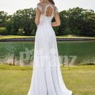 Women’s long white wedding tulle gown with sophisticated sleeveless bodice back side view