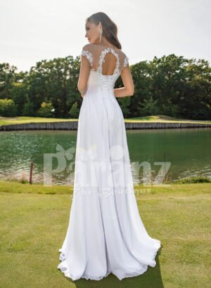 Women’s long white wedding tulle gown with sophisticated sleeveless bodice back side view