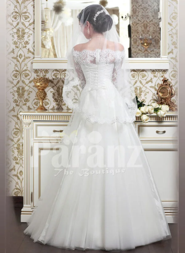 Women’s off-shoulder elegant lacy bodice wedding gown with flared tulle skirt in white back side view