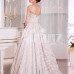 Women’s off-shoulder soft and rich satin floor length gown with all over white lace works side view