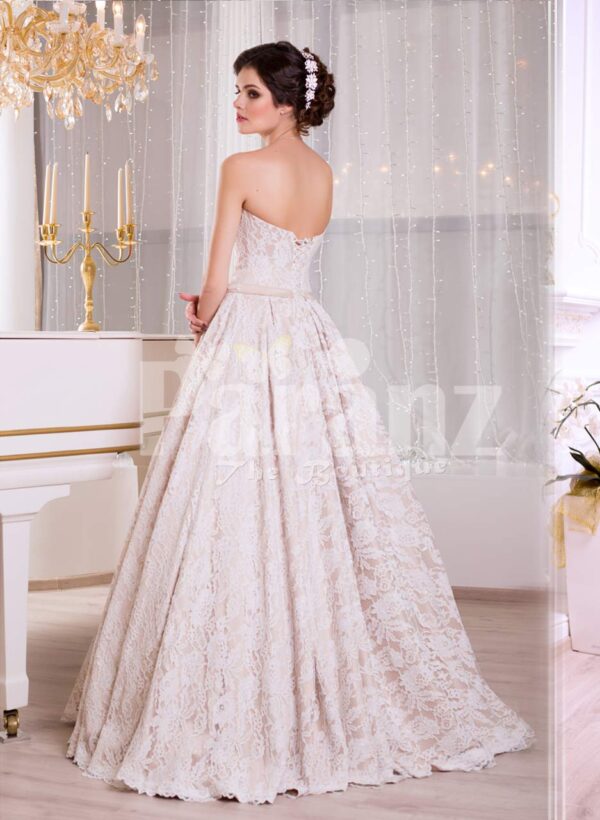 Women’s off-shoulder soft and rich satin floor length gown with all over white lace works side view
