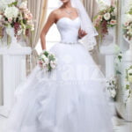 Women’s off-shoulder super stylish pearl white wedding gown with high volume tulle skirt