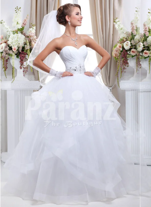 Women’s off-shoulder super stylish pearl white wedding gown with high volume tulle skirt