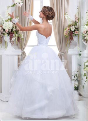 Women’s off-shoulder super stylish pearl white wedding gown with high volume tulle skirt back side view