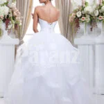 Women’s off-shoulder super stylish pearl white wedding gown with high volume tulle skirt back side view