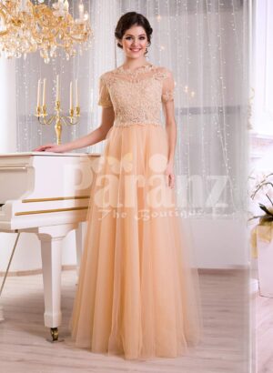 Women’s peachy orange short sleeve evening gown with long and soft tulle skirt