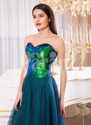Women’s peacock green off-shoulder sequin bodice evening gown with tulle skirt