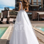 Women’s pearl white side slit tulle wedding gown with stunning lacy bodice back side view