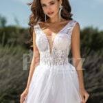 Women’s pearl white side slit tulle wedding gown with stunning lacy bodice close view
