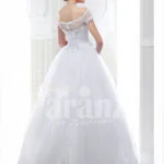 Women’s pretty princess style pearl white flared tulle skirt wedding gown back side view