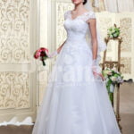 Women’s princess style rich white satin floor length wedding gown with tulle skirt underneath
