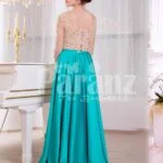 Women’s rich rhinestone work royal bodice elegant gown with metallic mint satin skirt back side view