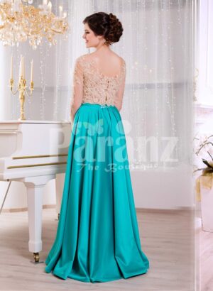 Women’s rich rhinestone work royal bodice elegant gown with metallic mint satin skirt back side view