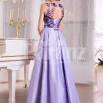 Women’s rich satin evening gown with long skirt and stylish satin-sheer bodice side view