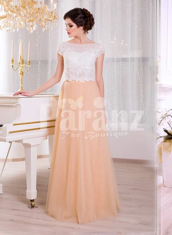 Women’s rich white rhinestone work bodice elegant evening gown with peach tulle skirt