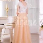 Women’s rich white rhinestone work bodice elegant evening gown with peach tulle skirt back side view