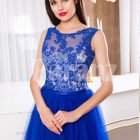 Women’s royal blue elegant evening gown with long tulle skirt and lacy bodice