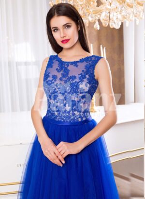 Women’s royal blue elegant evening gown with long tulle skirt and lacy bodice