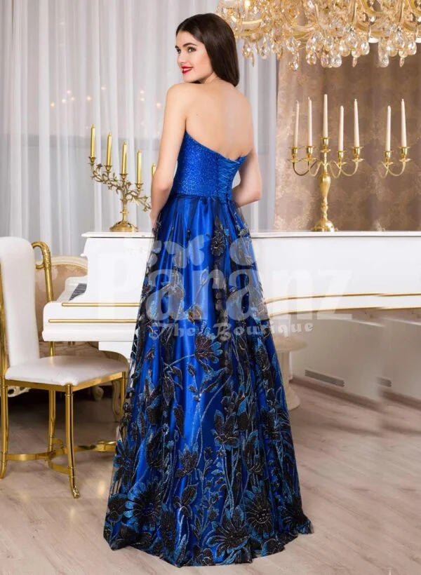 Women’s royal blue off-shoulder evening gown with floral appliquéd long skirt back side view