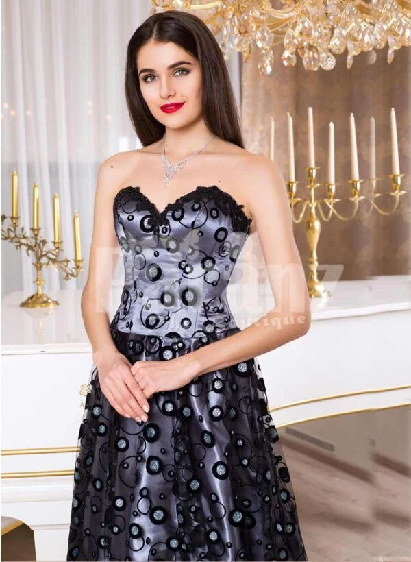 Women’s satin floor length evening gown with off-shoulder bodice and all over bubble print