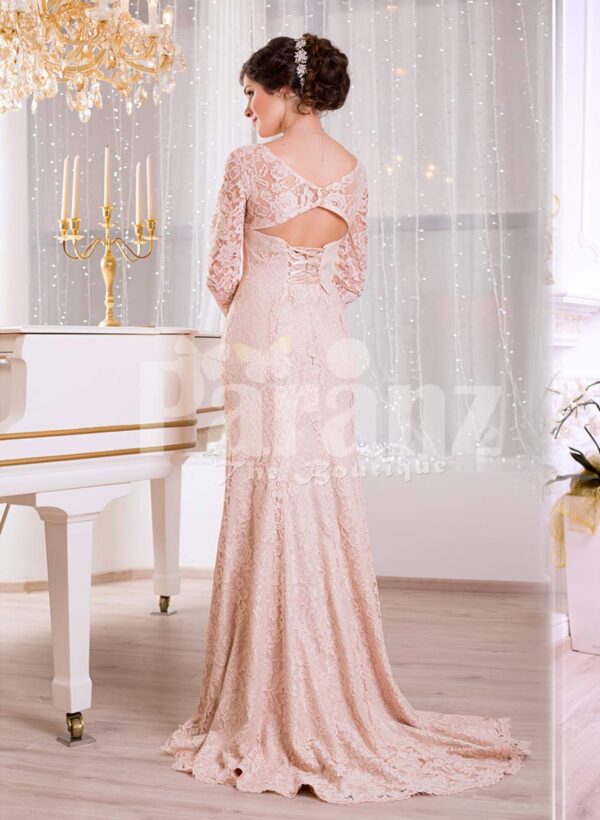 Women’s side slit full sleeve rich soft and smooth peach pink glam evening gown back side view