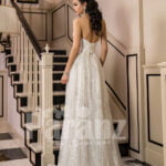 Women’s side slit white glitz wedding tulle gown with royal bodice back side view