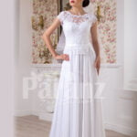 Women’s simple and elegant all white floor length lacy bodice wedding gown