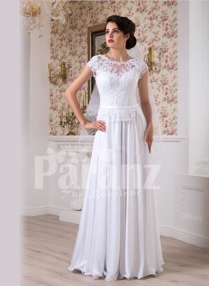 Women’s simple and elegant all white floor length lacy bodice wedding gown