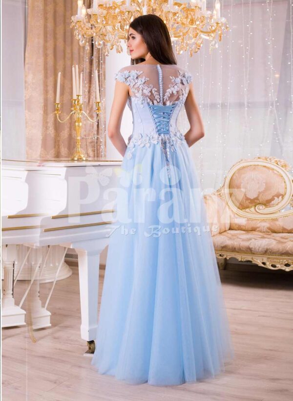 Women’s sky blue floor length evening gown with tulle skirt and floral bodice back side view