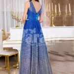 Women’s sleeveless glitz blue floor length satin skirt with high volume tulle skirt underneath back side view