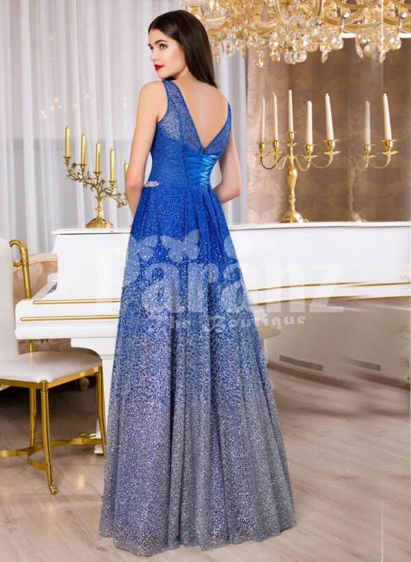 Women’s sleeveless glitz blue floor length satin skirt with high volume tulle skirt underneath back side view