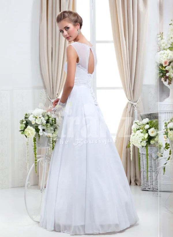 Women’s sleeveless lightweight rich satin wedding gown with royal rhinestone works back side view