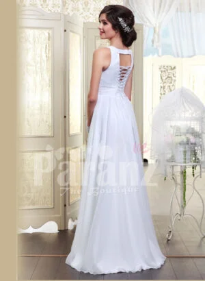 Women’s sleeveless pearl white floor length satin gown with glitz waist belt back side view