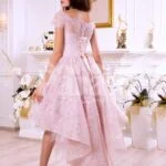 Women’s soft and light pink high low satin evening gown with elegant lace work all over back side view