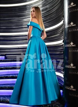 Women’s soft and silky floor length rich satin gown with side slit skirt in bright blue side view