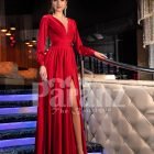 Women’s soft and smooth deep red evening gown with side slit skirt and full sleeves