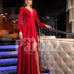 Women’s soft and smooth deep red evening gown with side slit skirt and full sleeves